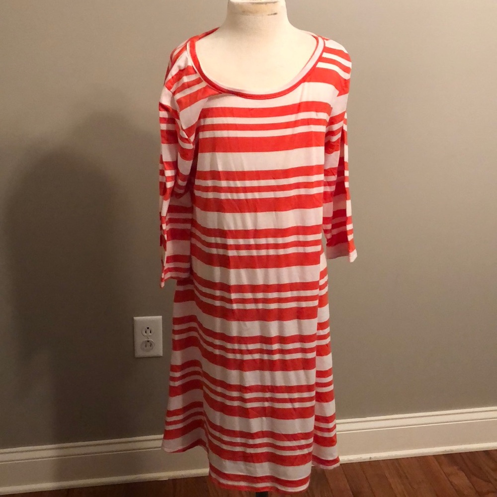 Orange and white long sleeve dress.